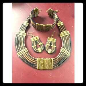 Artisan hand tooled leather, brass & copper